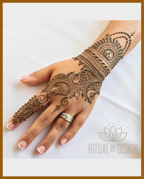 Stylish Back Hand Mehndi Design Extended Till Wrist